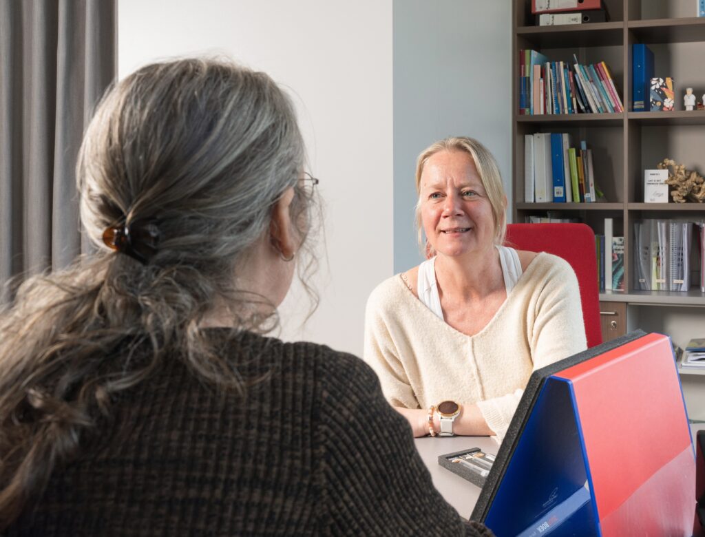 Physician Assistants (PA) in gesprek met patient
