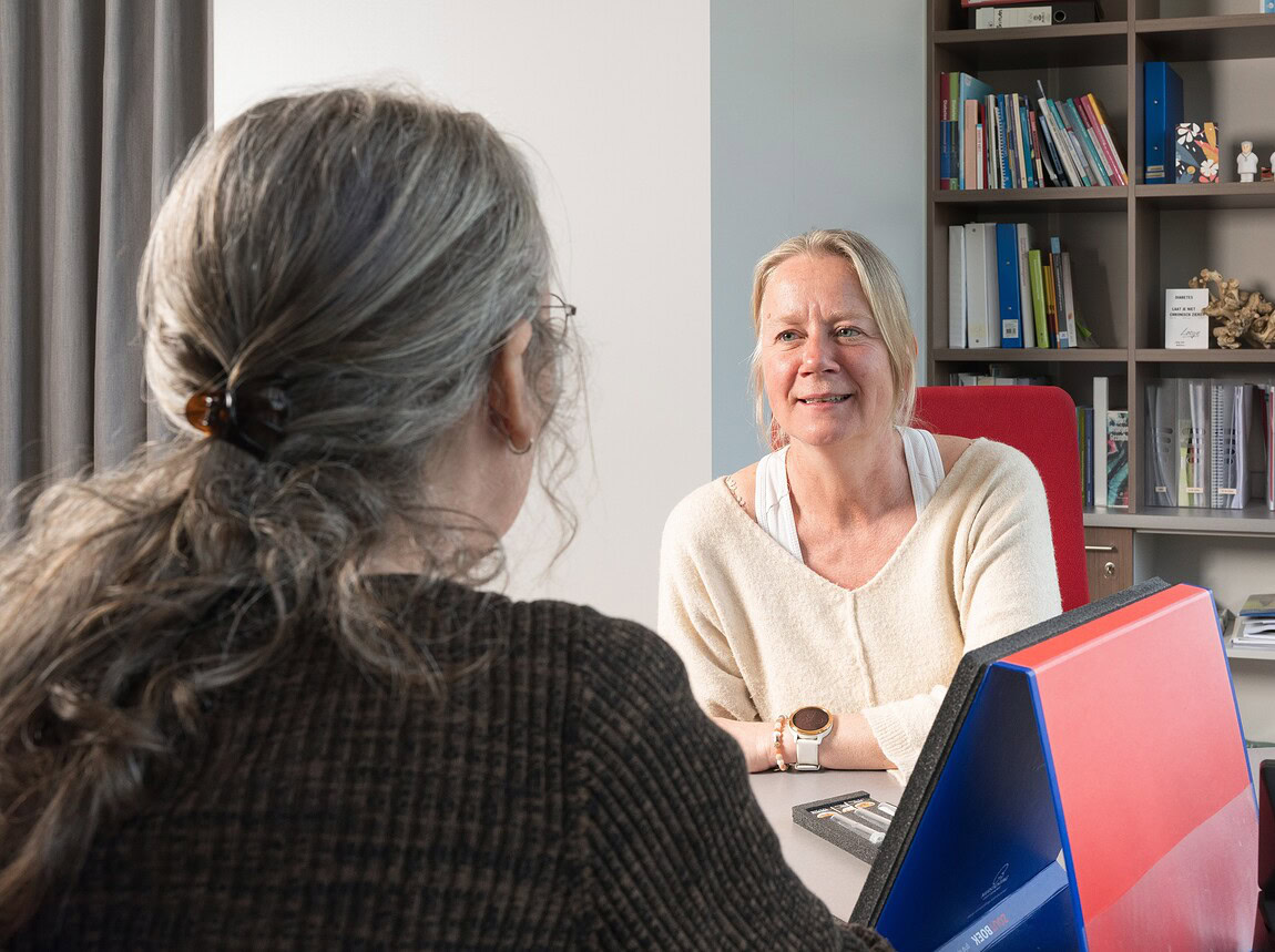 Physician Assistants (PA) in gesprek met patient